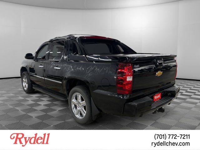 2013 Chevrolet Avalanche — rear three-quarter view